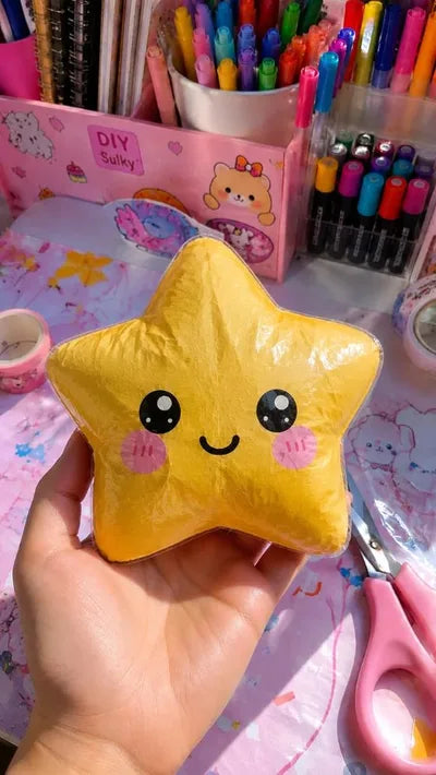Paper Squishy de estrella amarilla sonriente